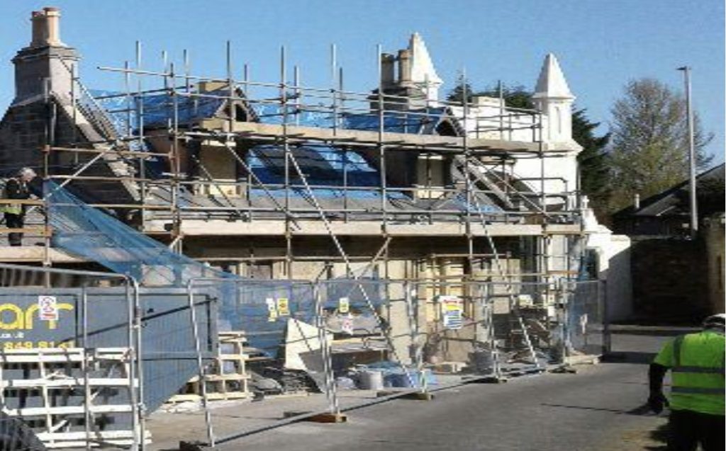 Scaffolding over building at Ayr Cemetery