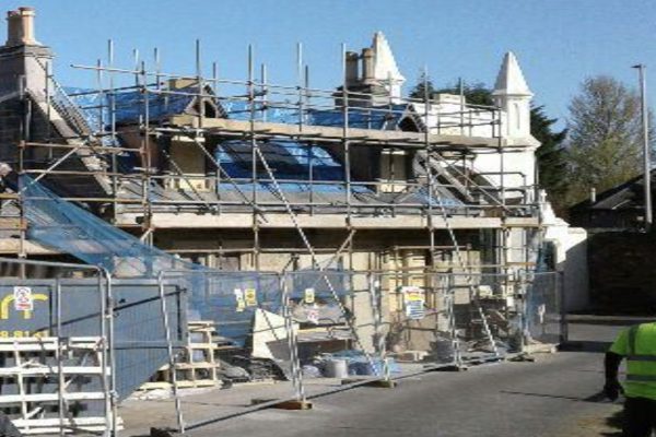 Scaffolding over building at Ayr Cemetery